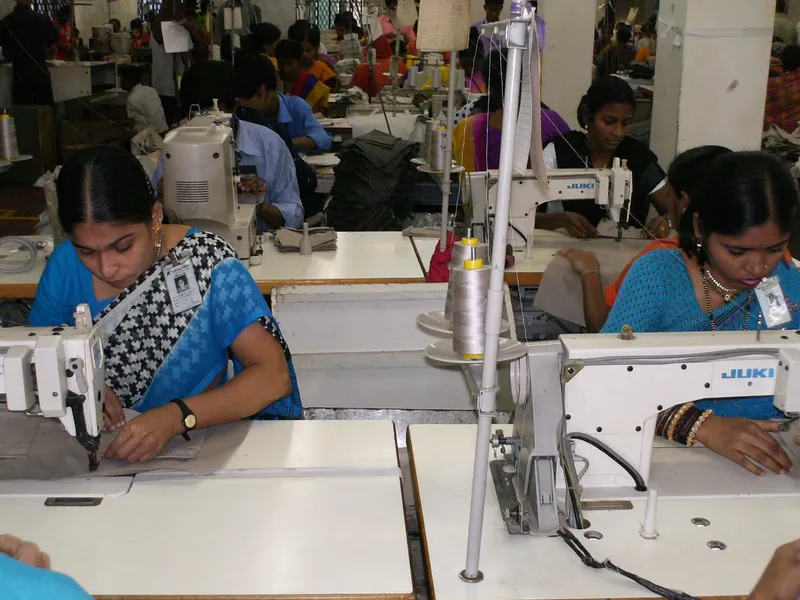 Garment factory workers at production line